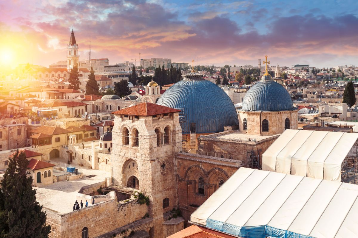 The domes of the Church of the Holy Sepulcher above the rooftops of Jerusalem’s Old City